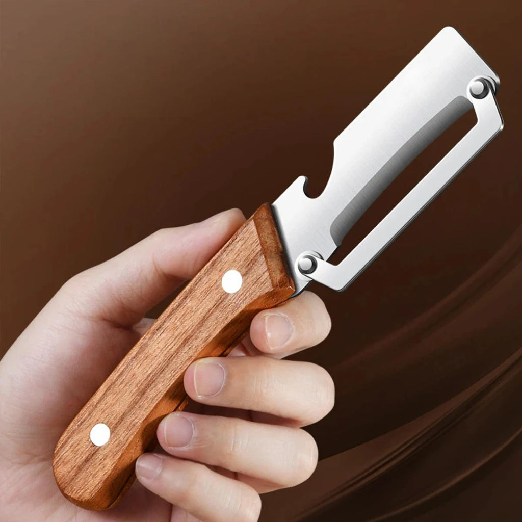 Stainless steel peeler slicing fruits and vegetables